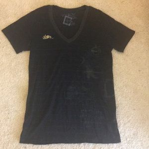 Black and gold striped Volcom tee shirt. Large.